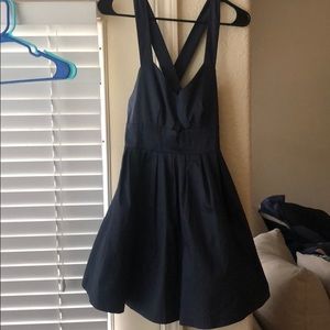Cris-cross, navy blue deep back dress.